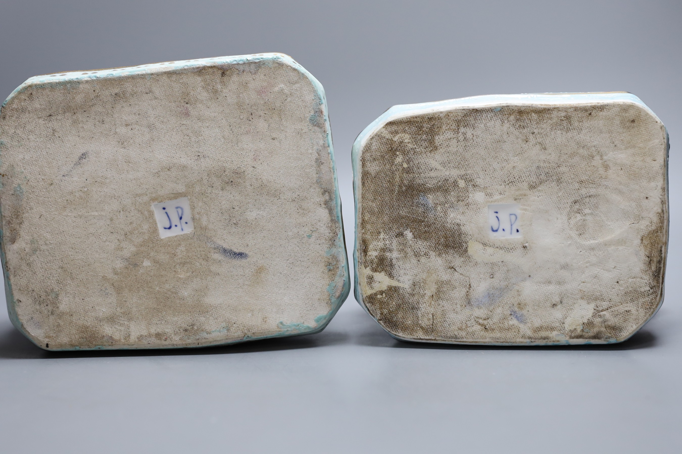 A pair of Jacob Petit style porcelain dressing table scent bottles, modelled as seated Turks, 26cm